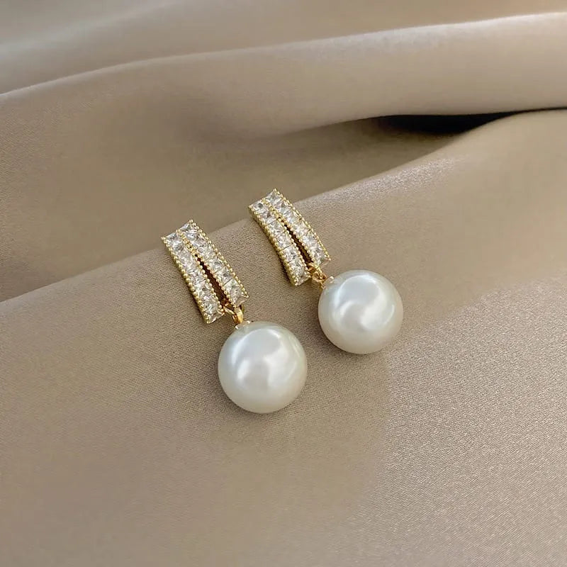 A white pearl earrings